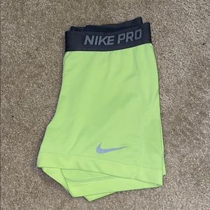 Neon yellow Nike pros.